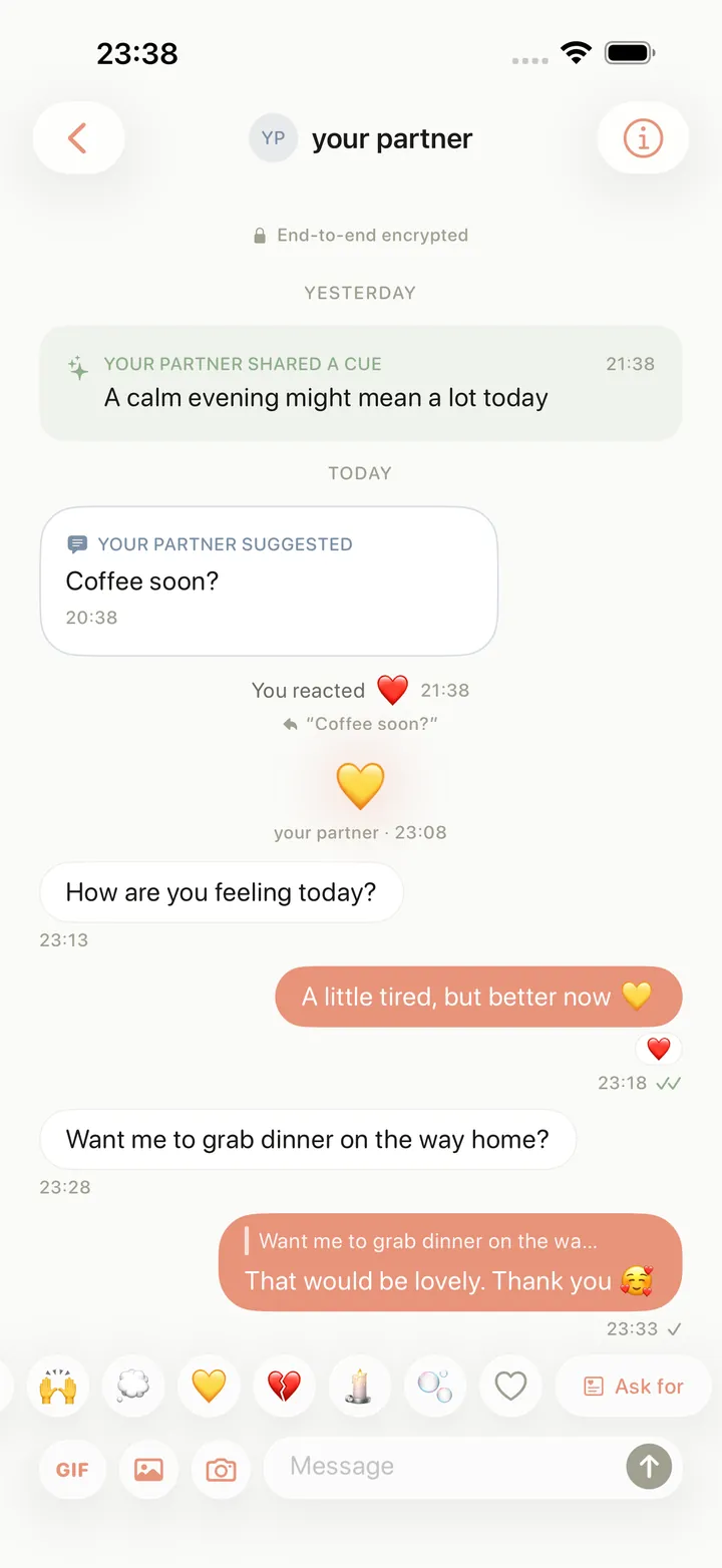 The Pulse chat on iPhone, end-to-end encrypted, with a held heart between the two partners